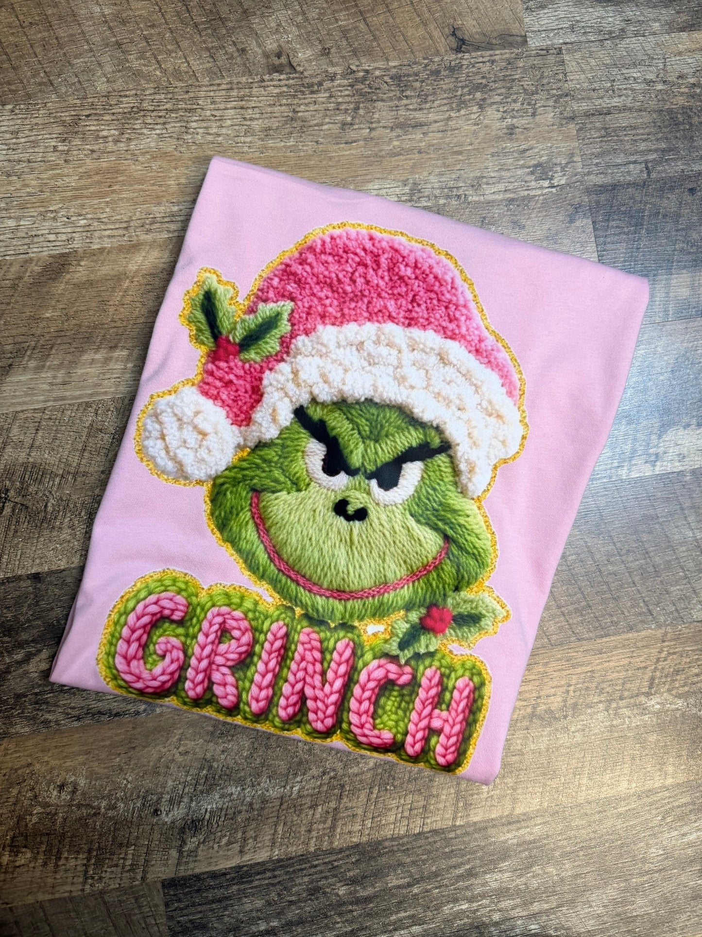 Light Pink Long Sleeve Tee with Green Character Graphic | Festive Holiday Top