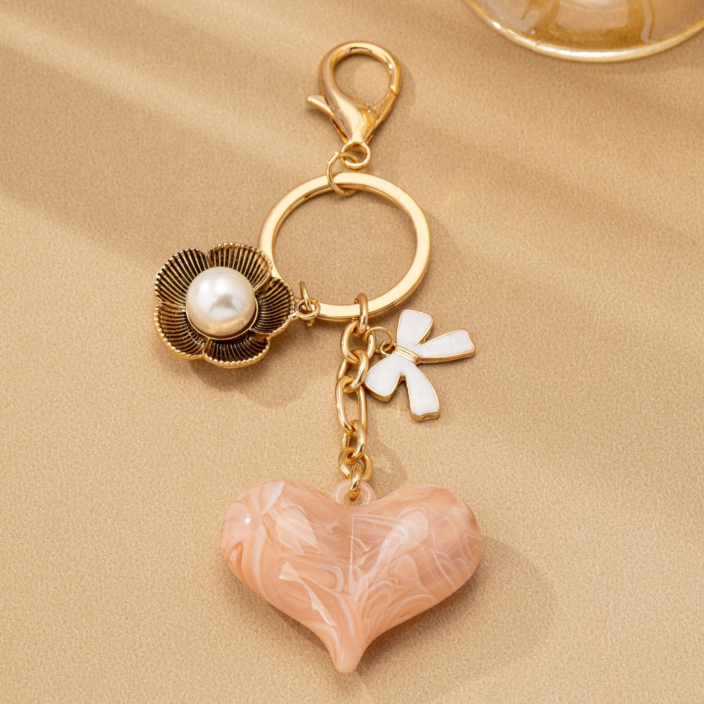 BAG CHARM KEY CHAIN-SWIRL HEART PERAL FLORAL BOW | 80K090