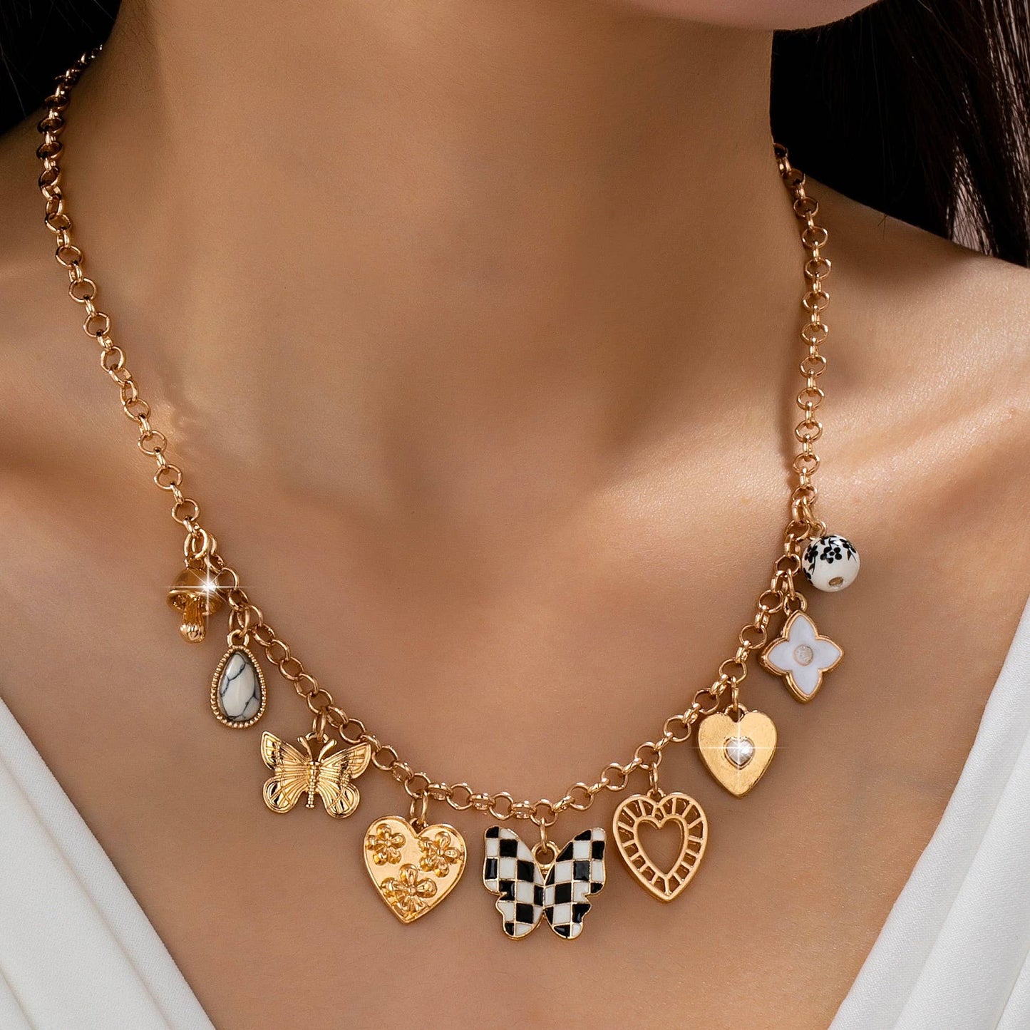 Gold Charm Necklace with Hearts Butterflies and Pearls | Checkered Floral Statement Necklace