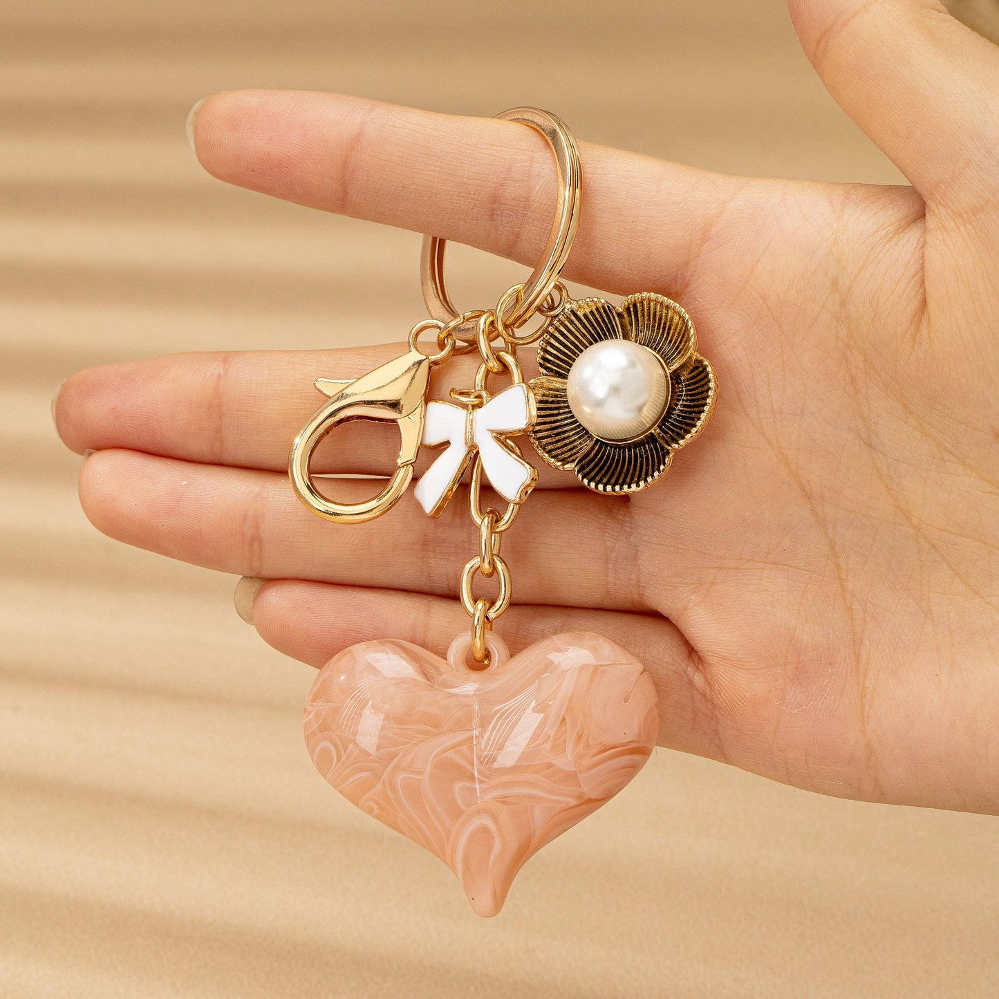 BAG CHARM KEY CHAIN-SWIRL HEART PERAL FLORAL BOW | 80K090