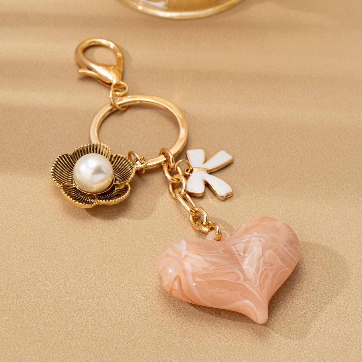 BAG CHARM KEY CHAIN-SWIRL HEART PERAL FLORAL BOW | 80K090