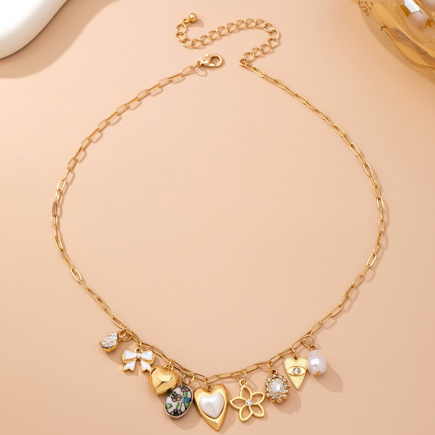 Gold Heart Charm Necklace with Pearls and Crystals | Romantic Multi Charm Statement Necklace
