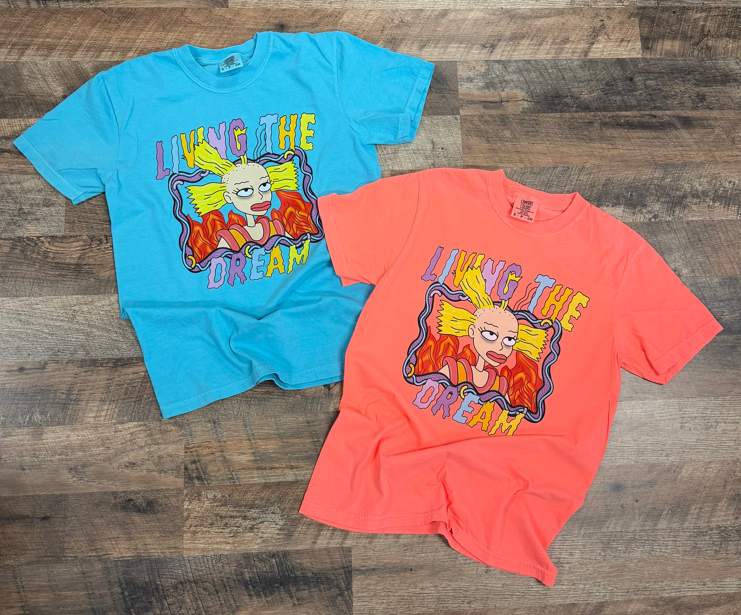 “Living the Dream” Cartoon Graphic T-Shirt – Lagoon Blue & Neon Coral