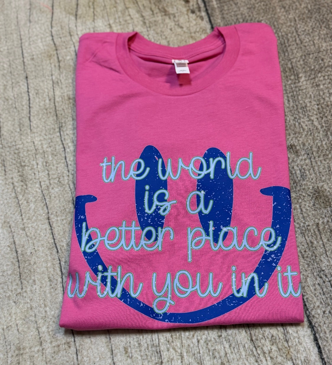 Bella Canvas Smiley Face Tee – “The World Is a Better Place with You in It” Graphic Shirt