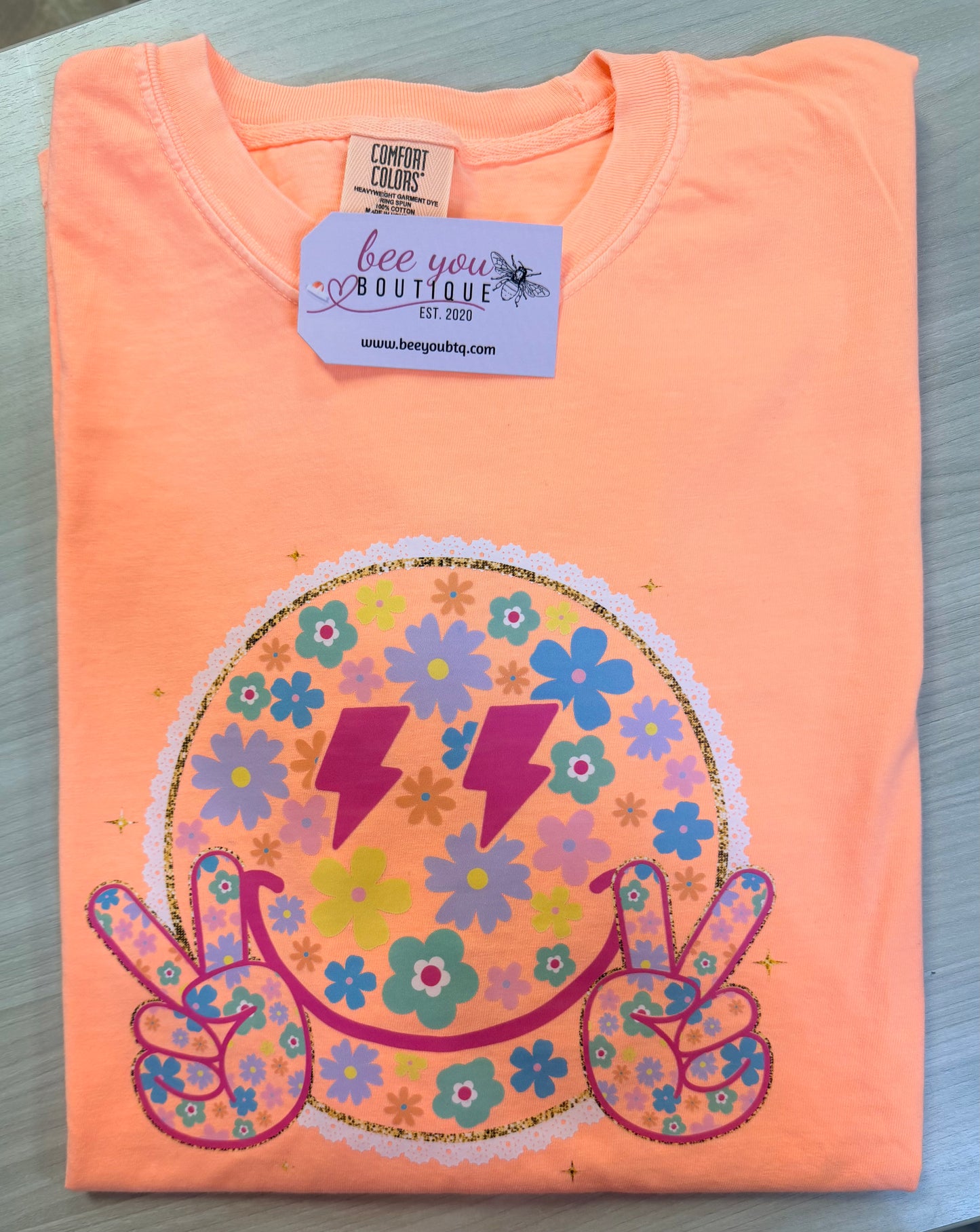 Comfort Colors Neon Smiley Face Tee – Floral Peace Sign Lightning Eyes Graphic T-Shirt