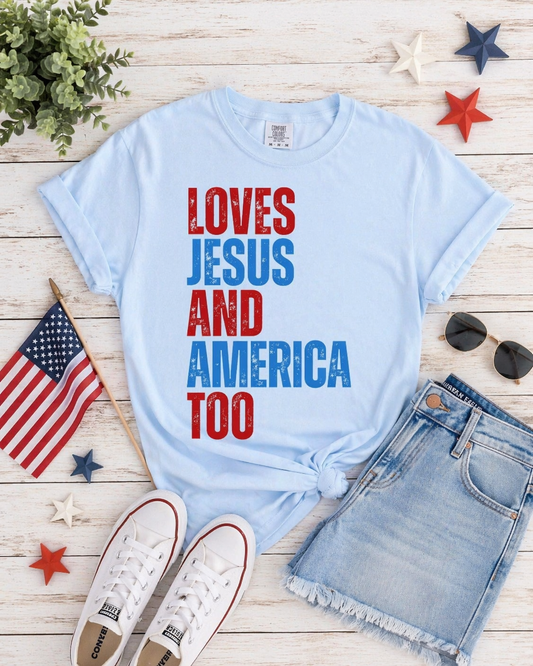 Comfort Colors Loves Jesus & America Too Tee – Light Blue Patriotic Graphic T-Shirt