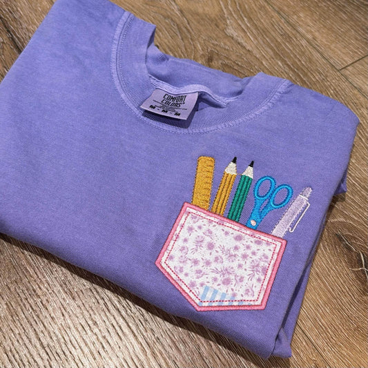 Comfort Colors Embroidered School Supplies T-Shirt | Faux Pocket Teacher Tee