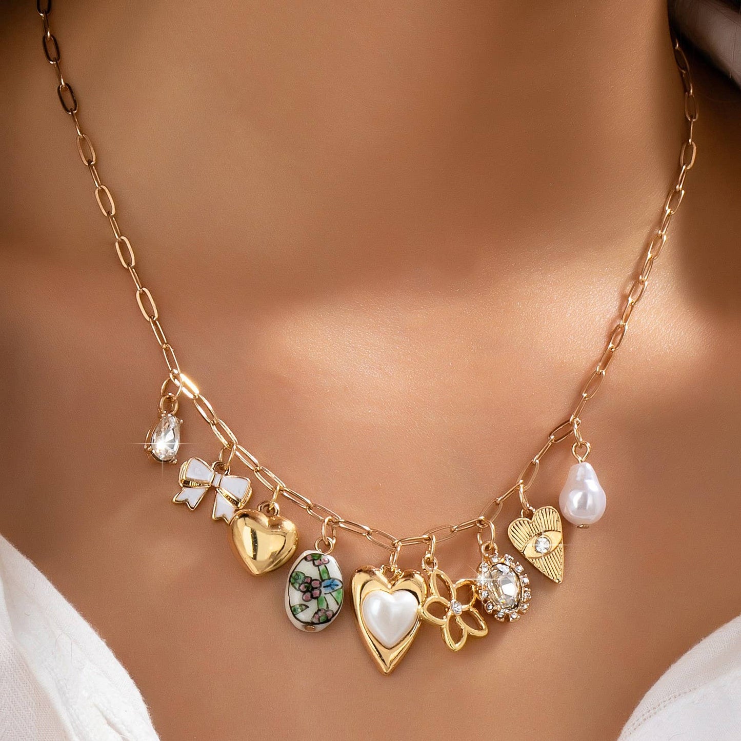 Gold Heart Charm Necklace with Pearls and Crystals | Romantic Multi Charm Statement Necklace